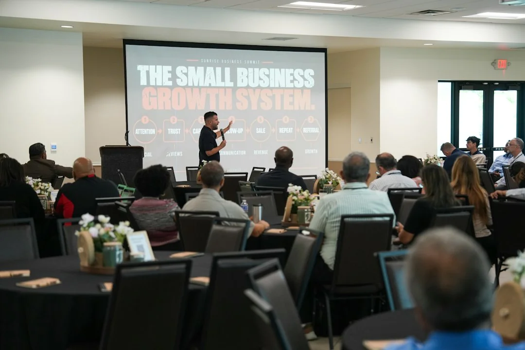 Workshop event with an audience and a facilitator presenting