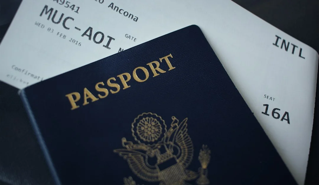 Passport and visa application documents on a desk